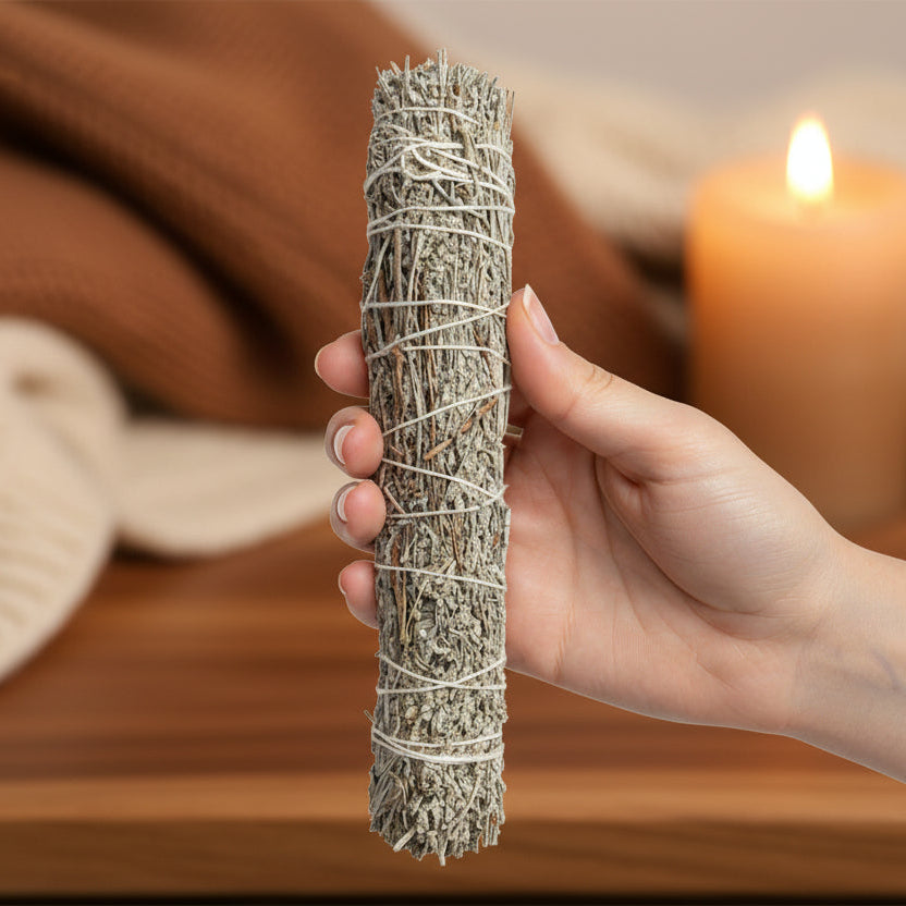 Bundled sage on a wooden surface