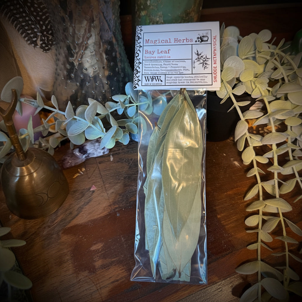 Packaged leaves on a wooden surface with decorative elements