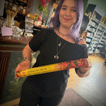 Person holding a Jamaican Fruit product in a store setting