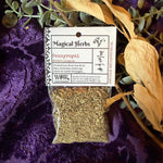 Herbal package labeled 'Magical Herbs' with dried herbs on a purple fabric background