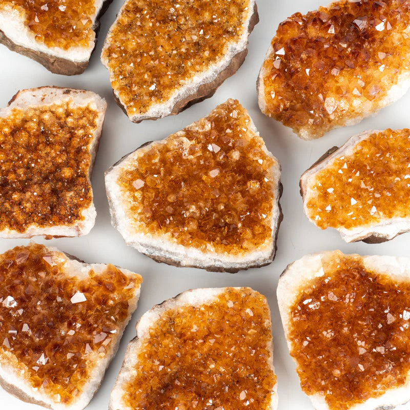 Close-up of brown crystal rock slices on a white background