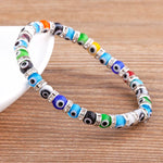 Colorful beaded bracelet on a wooden surface