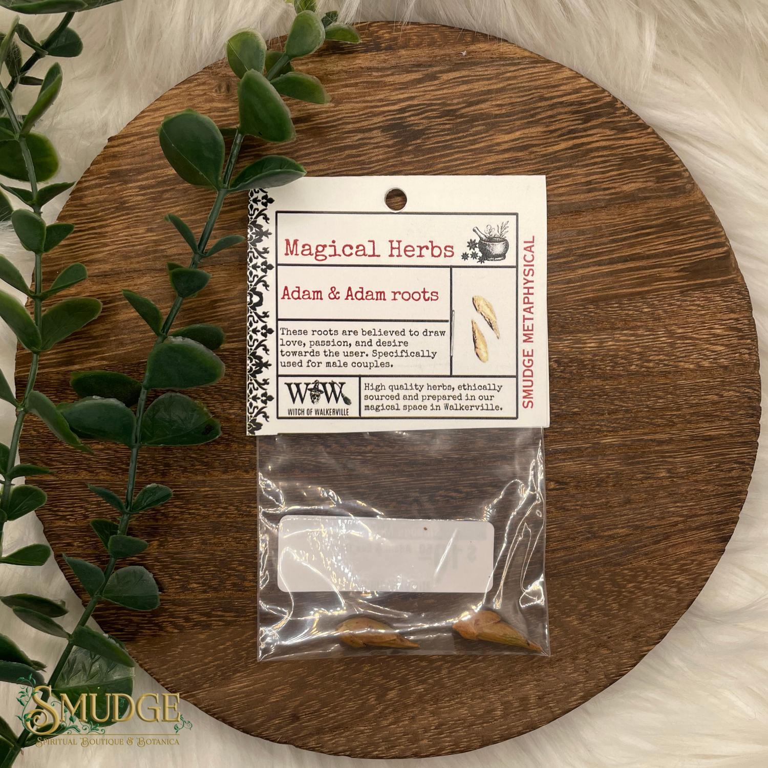 Packaged herbs on a wooden board with a label, surrounded by greenery.