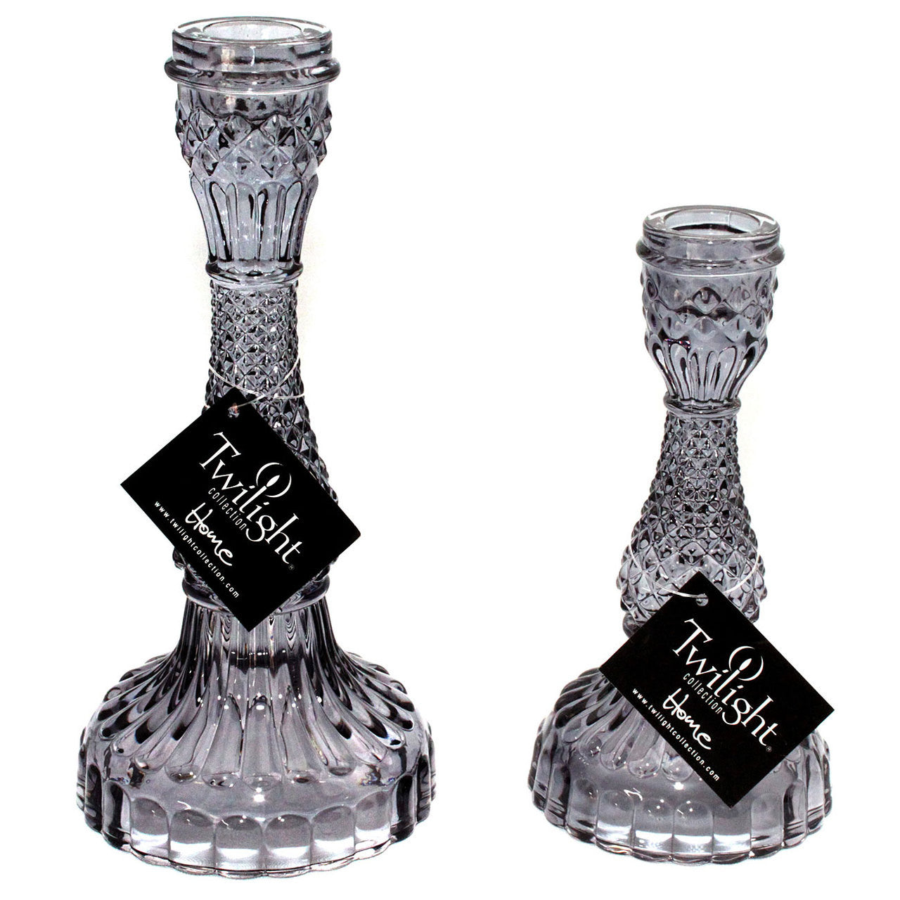 Two crystal candle holders with 'Twilight' labels on a white background