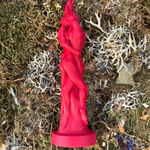 Red candle of an entwined couple on a textured, natural background with 'Smudge' branding.