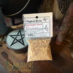 A clear plastic bag filled with chopped light brown herbal pieces hangs from a printed paper header card labeled 'Magical Herbs Gelagal Root cut'. The package is photographed on a dark wooden surface with a metal tin featuring a black pentagram and other occult-themed decor in the background.
