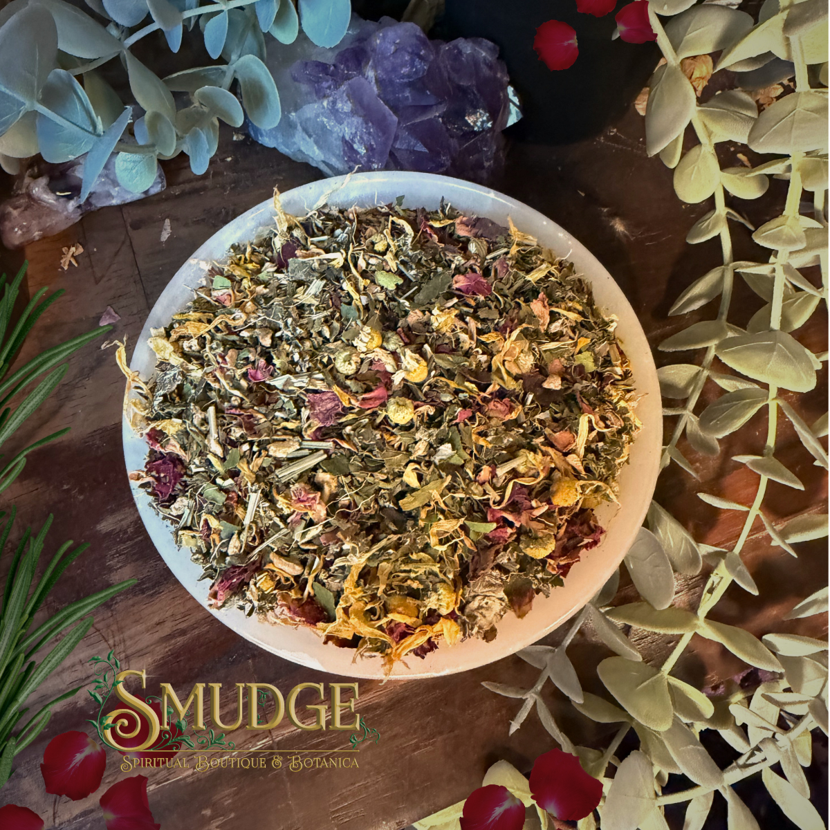 Loose Leaf tea in a bowl named Moontime tea on a wood table with leaves around it.