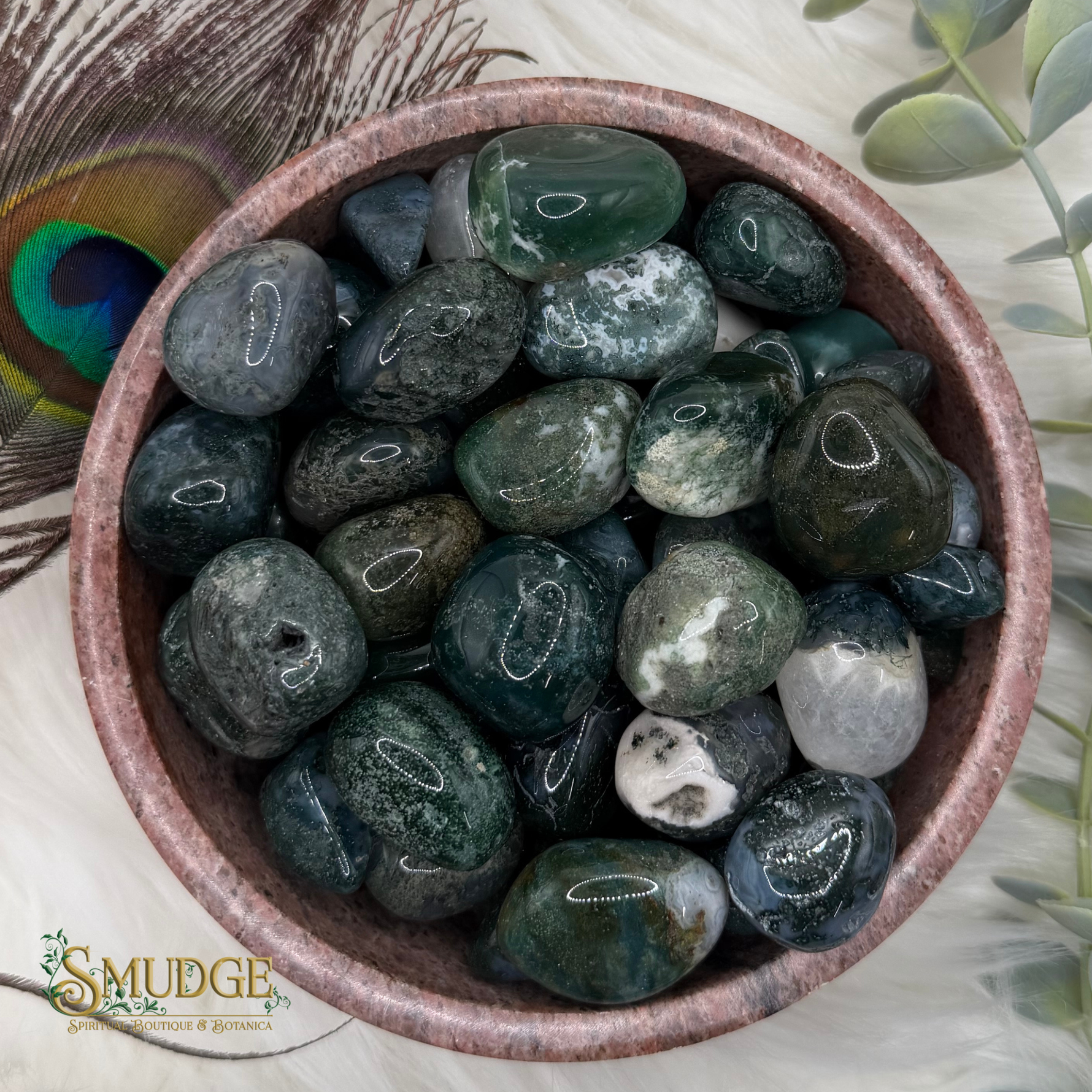 Green round stones in bowl with Smudge logo