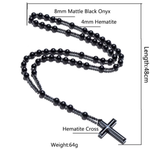 Black beaded necklace with hematite cross, measurements, and weight displayed.