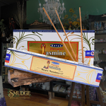 Satya Natural Jasmine incense packaging with sticks on a blurred background