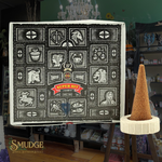Decorative box with astrological symbols and 'Super Hit' branding in a room setting.