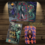 Trick or treat tarot deck with cards from the deck around it. 