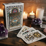 Tarot card deck with intricate designs on a wooden surface